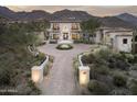 Elegant home with a fountain in the courtyard and mountain views at 21487 N 110Th Pl, Scottsdale, AZ 85255