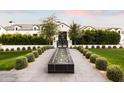 Elegant entryway with a water fountain and manicured landscaping at 3827 E Marlette Ave, Paradise Valley, AZ 85253