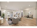 Stylish living room with modern furniture, tile floors, and an open layout for easy entertaining at 9270 E Mission Ln # 117, Scottsdale, AZ 85258