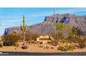 Gold Canyon community sign with mountain views and desert vegetation at 10306 E Rising Sun Pl, Gold Canyon, AZ 85118