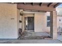 Inviting front entrance with decorative wreath and neutral paint at 1245 E Avenida Hermosa --, Phoenix, AZ 85014