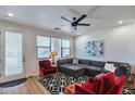 Relaxing living room with sectional sofa and large window at 34457 N Legend Trail Pkwy # 1018, Scottsdale, AZ 85262