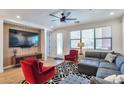 Open concept living room featuring a sectional sofa and accent chairs at 34457 N Legend Trail Pkwy # 1018, Scottsdale, AZ 85262