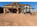 New home under construction, framing visible at 47476 W Kenner Dr, Maricopa, AZ 85139