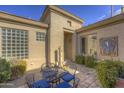 Private courtyard with seating area and southwestern decor at 6788 E Nightingale Star Cir, Scottsdale, AZ 85266