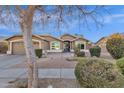 Charming single-story home featuring a desert landscape and a well maintained yard at 924 S Evergreen St, Chandler, AZ 85225