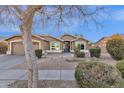 Charming single-story home featuring a desert landscape and a well maintained yard at 924 S Evergreen St, Chandler, AZ 85225