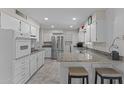 Kitchen with stainless steel appliances and granite countertops at 9890 N Balboa Dr, Sun City, AZ 85351