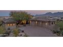 Three-car garage and expansive driveway at 25453 N 113Th Way, Scottsdale, AZ 85255