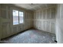 New construction bedroom featuring a window overlooking the exterior, ready for customization at 32693 N Newby Dr, San Tan Valley, AZ 85143