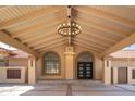 Elegant entrance with double door and modern chandelier at 37020 N 31St Ave, Phoenix, AZ 85086