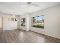 Bright dining room with hardwood floors and large windows at 4644 N 22Nd St # 1017, Phoenix, AZ 85016