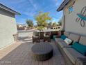 Outdoor patio with wicker furniture, creating a relaxing space at 5840 S Pico St, Gilbert, AZ 85298