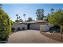 Modern single story home with gated entry and paved driveway at 7605 E Via De Lindo --, Scottsdale, AZ 85258