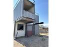 Unfinished container home under construction, showing structural components at 9428 N 9Th Ave, Phoenix, AZ 85021