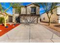 Two-story house with a two-car garage and landscaped front yard at 18907 N Vemto St, Maricopa, AZ 85138