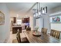 Welcoming dining area adjacent to the kitchen, perfect for Gathering meals at 3937 S 79Th Ln, Phoenix, AZ 85043