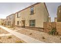 Two-story home with a low maintenance yard and neutral exterior paint at 3937 S 79Th Ln, Phoenix, AZ 85043