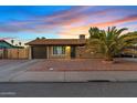 Single story home with attached garage and desert landscaping at 730 W El Alba Way, Chandler, AZ 85225