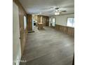 Spacious living room with kitchen island at 16634 N Queen Esther Dr, Surprise, AZ 85378