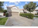 Charming townhouse boasts a spacious two-car garage, well-manicured landscaping, and inviting curb appeal at 9705 E Mountain View Rd # 1050, Scottsdale, AZ 85258