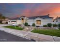 Beautiful one-story home with a three-car garage and mature landscaping at 5635 W Melinda Ln, Glendale, AZ 85308