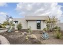 Contemporary home with drought-tolerant landscaping at 7153 E Ironwood Dr, Paradise Valley, AZ 85253