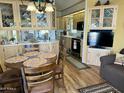 Eat-in kitchen with light wood cabinets and stainless steel appliances at 7750 E Broadway Rd # 860, Mesa, AZ 85208