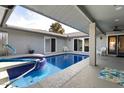 Inviting pool and spa area with covered patio at 10377 W White Mountain Rd, Sun City, AZ 85351