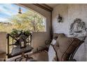 Furnished patio with decorative fountain and mountain views at 3236 E Chandler Blvd # 2053, Phoenix, AZ 85048