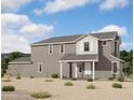 Two-story home with gray siding, white accents, and a covered porch at 26021 N 23Rd Ave, Phoenix, AZ 85085