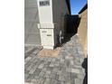 Attractive gray brick paver walkway extends toward the back gate at 3742 E Rochelle Cir, Mesa, AZ 85213