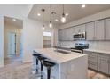Modern kitchen featuring a large island and stainless steel appliances at 1238 S 14Th St, Phoenix, AZ 85034