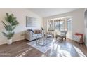 Cozy living room featuring a neutral color palette and bay window at 1326 E Clearwater Ln, Gilbert, AZ 85234