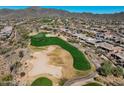 Scenic aerial of community golf course, homes, and the natural desert landscape at 41515 N Laurel Valley Way, Anthem, AZ 85086