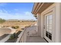 Balcony with mountain views and French doors at 10765 N 119Th St, Scottsdale, AZ 85259