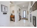 Bright entryway with tile flooring and decorative accents at 16247 S 180Th Dr, Goodyear, AZ 85338