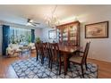 Spacious dining area with hardwood floors and large windows at 21 W Del Rio Dr, Tempe, AZ 85282