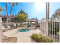 Community spa with surrounding lush landscaping at 2929 W Yorkshire Dr # 1118, Phoenix, AZ 85027