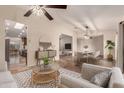 Bright and airy living room featuring stylish furniture and an open floor plan at 302 E Coral Gables Dr, Phoenix, AZ 85022