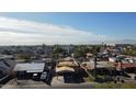 View of construction project on single story home in suburban neighborhood at 3133 W Polk St, Phoenix, AZ 85009