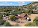 Aerial view of single-story home with mountain views at 4510 E Pepper Tree Ln, Paradise Valley, AZ 85253