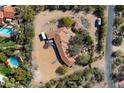 Aerial view of single-story home with pool at 4510 E Pepper Tree Ln, Paradise Valley, AZ 85253