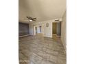 Spacious living area with tile flooring and neutral walls at 6039 N 73Rd Ave, Glendale, AZ 85303