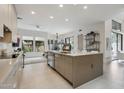 Modern kitchen featuring a large island, stainless steel appliances, and sleek cabinetry at 7705 E Doubletree Ranch Rd # 56, Scottsdale, AZ 85258