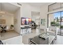 Spacious living room featuring sleek tile floors, modern décor, and seamless flow to other areas at 7705 E Doubletree Ranch Rd # 56, Scottsdale, AZ 85258