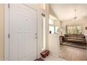 Bright entryway with view into living room at 7928 E Pueblo Ave # 62, Mesa, AZ 85208