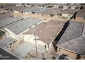 Aerial view of a house and surrounding neighborhood at 11472 W Cumberland Dr, Youngtown, AZ 85363