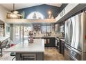 Modern kitchen with stainless steel appliances and an island at 12858 W Wilshire Dr, Avondale, AZ 85392