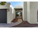 Front entry with arched window and walkway at 321 W Palo Verde St, Gilbert, AZ 85233